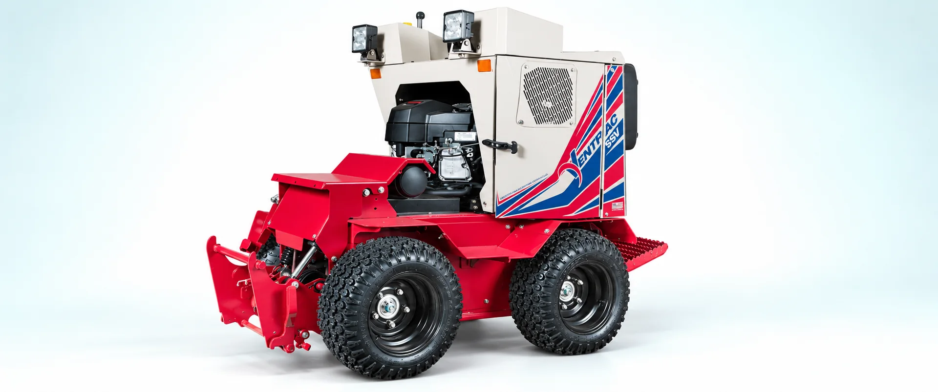 Ventrac 2100C — Stand-on version with single turf wheels and an empty front attachment hitch.